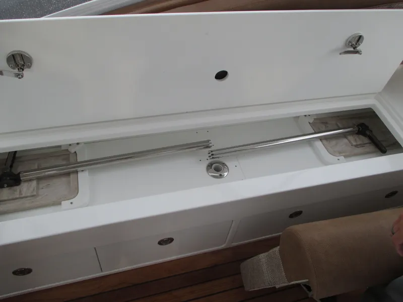 Slide: The Image of Jersey Cape Devil 36 Custom 2024 storage compartment with fishing rod holder. - 19