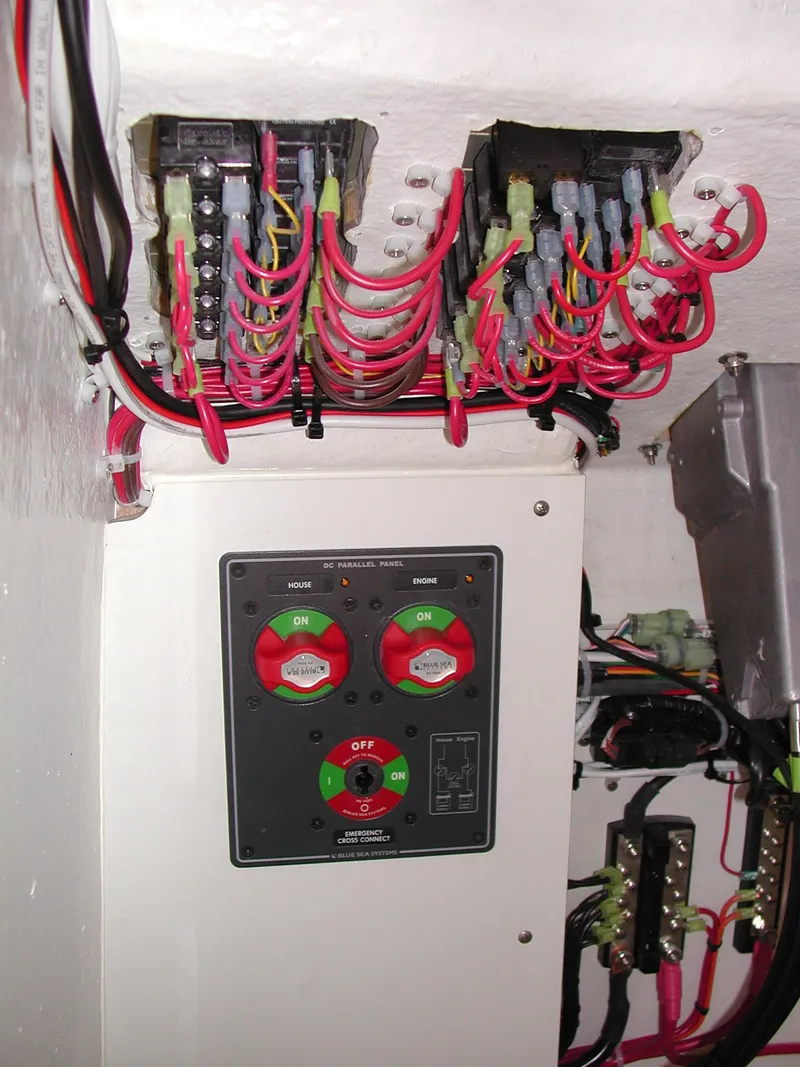 Slide: The Image of Electrical panel and wiring in a 2024 Jersey Cape 31 Little Devil boat. - 12