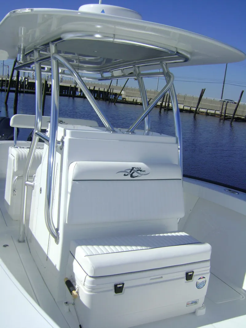 Slide: The Image of 2024 Jersey Cape 31 Little Devil boat with sleek white seating and T-top. - 17