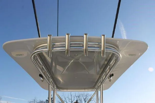 Slide: The Image of 2024 Jersey Cape 31 Little Devil boat top view with rod holders. - 19