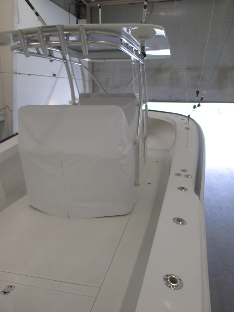 Slide: The Image of 2024 Jersey Cape 31 Little Devil boat interior with covered console. - 24