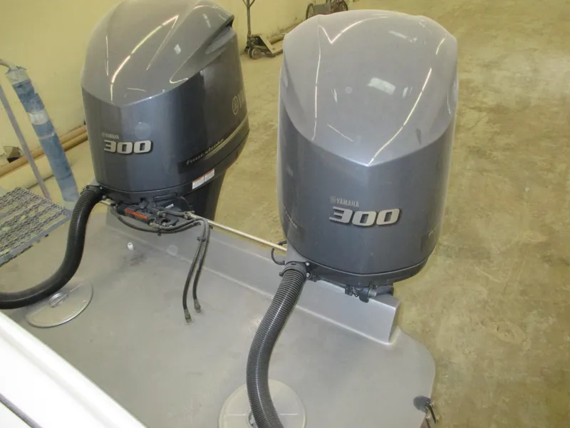 Slide: The Image of Twin Yamaha 300 outboard engines on a 2024 Jersey Cape 31 Little Devil boat. - 26