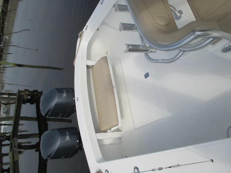 Slide: The Image of 2024 Jersey Cape 31 Little Devil boat with twin outboard engines. - 30