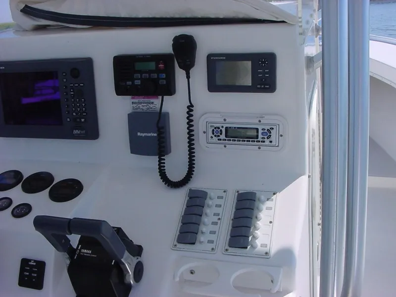 Slide: The Image of Control panel of a 2024 Jersey Cape 31 Little Devil boat with navigation and communication equipment. - 31