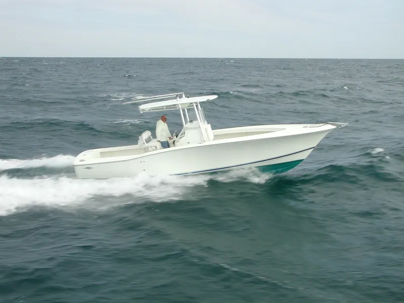 Slide: The Image of 2024 Jersey Cape 31 Little Devil boat cruising on open water. - 32