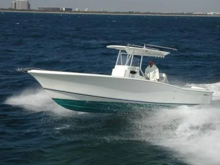 Slide: The Image of 2024 Jersey Cape 31 Little Devil boat cruising on the ocean. - 33