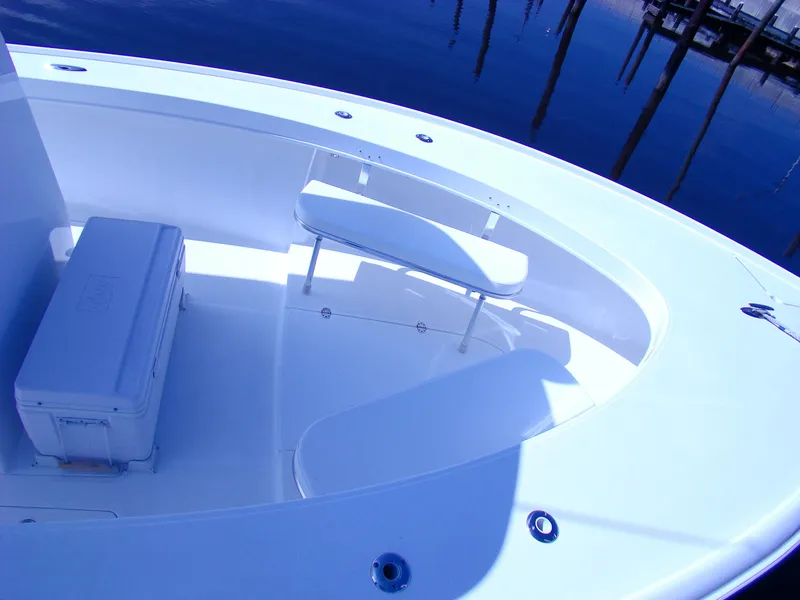 Slide: The Image of 2024 Jersey Cape 31 Little Devil boat interior with seating and cooler. - 9