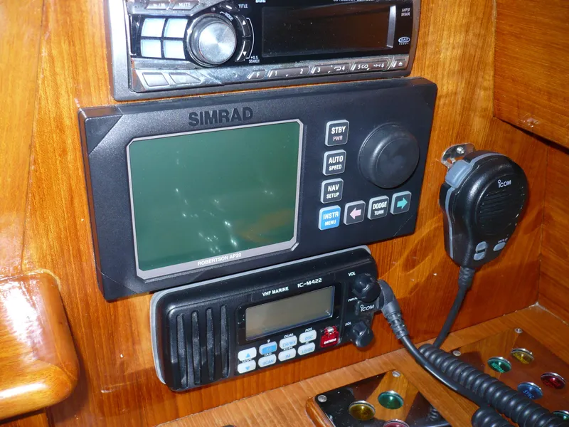 Slide: The Image of Navigation and communication equipment on a 1999 Classic Coaster Picnic Boat. - 17