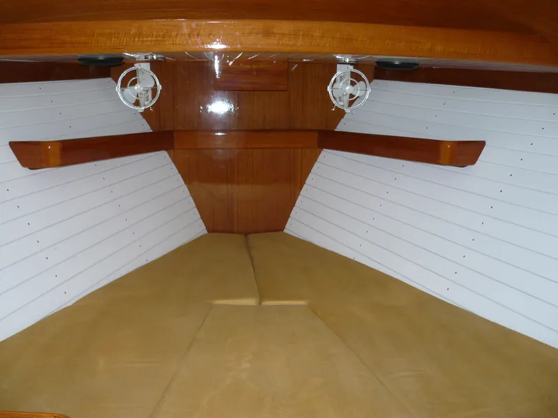Slide: The Image of Interior of 1999 Classic Coaster Picnic Boat with wooden finish and white paneling. - 20