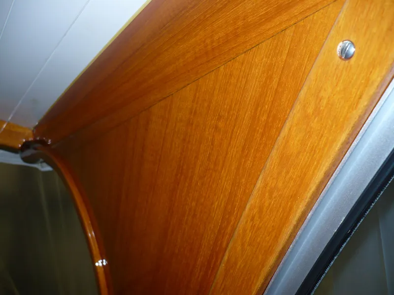 Slide: The Image of Wooden interior detail of a 1999 Classic Coaster Picnic Boat. - 25