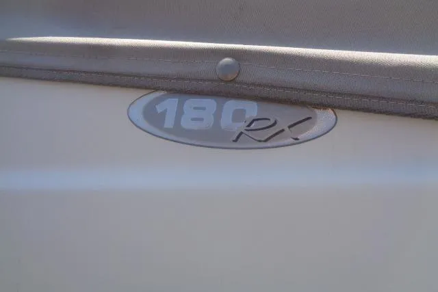 Slide: The Image of 2005 Stingray 180RX boat emblem close-up. - 4