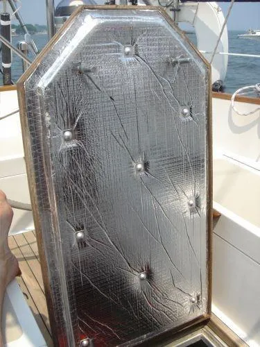 Slide: The Image of Reflective panel on a 1980 Hinckley 43 sailboat deck, enhancing insulation and protection. - 10