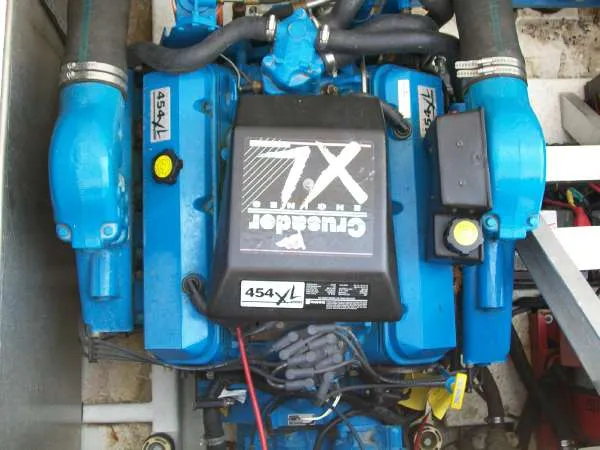 Slide: The Image of Engine of a 1999 Gibson 44 Standard Houseboat, Crusader 454 XL. - 18
