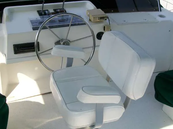 Slide: The Image of Helm station of a 1999 Gibson 44 Standard houseboat. - 6