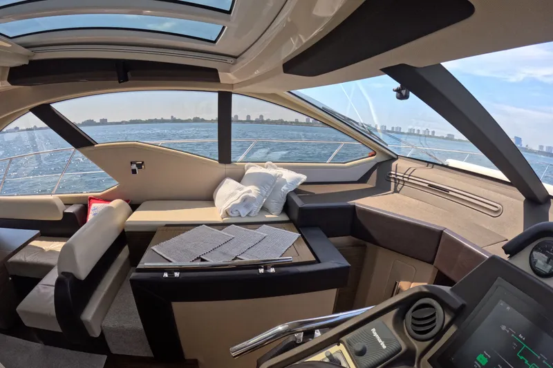 Slide: The Image of Luxurious interior of a 2016 Azimut 55S yacht with panoramic ocean views. - 67
