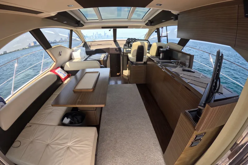Slide: The Image of Luxurious interior of a 2016 Azimut 55S yacht with panoramic ocean views. - 41