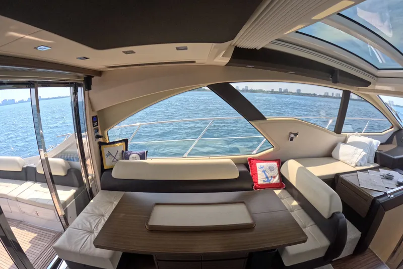 Slide: The Image of Luxurious interior of a 2016 Azimut 55S yacht with scenic ocean view. - 52