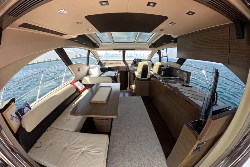 Slide: The Image of Luxurious interior of a 2016 Azimut 55S yacht with panoramic ocean views. - 43