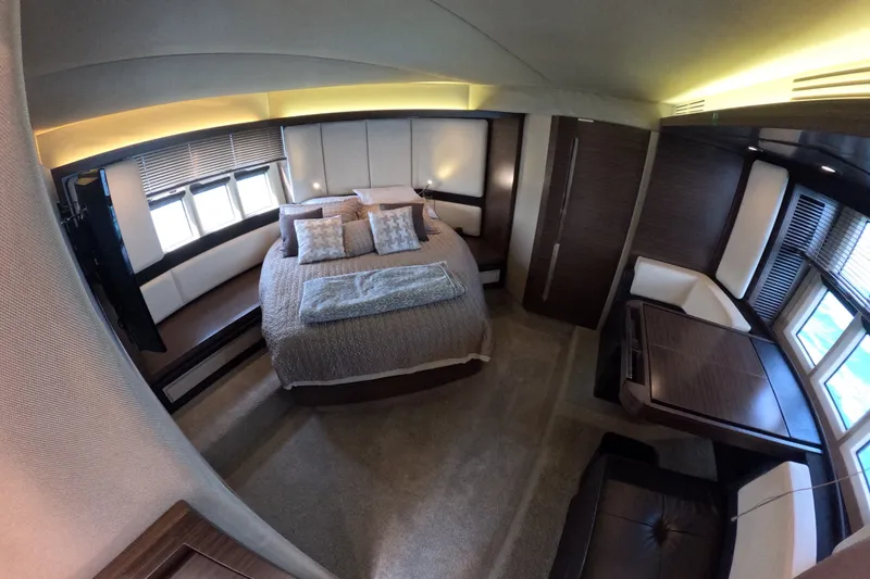 Slide: The Image of Luxurious interior of a 2016 Azimut 55S yacht, featuring a spacious bedroom with elegant decor. - 80