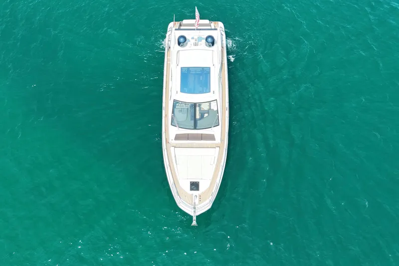 Slide: The Image of Overhead view of 2016 Azimut 55S yacht on turquoise water. - 8