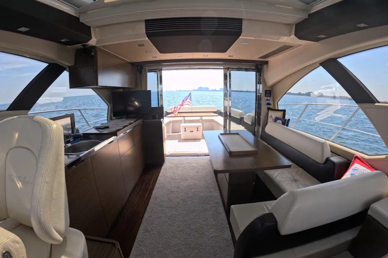 Slide: The Image of Luxurious interior of 2016 Azimut 55S yacht with ocean view and elegant furnishings. - 69