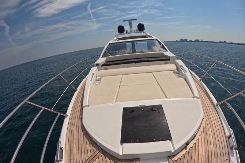 Slide: The Image of Luxury Azimut 55S yacht cruising on open sea, showcasing sleek design and spacious deck. - 23
