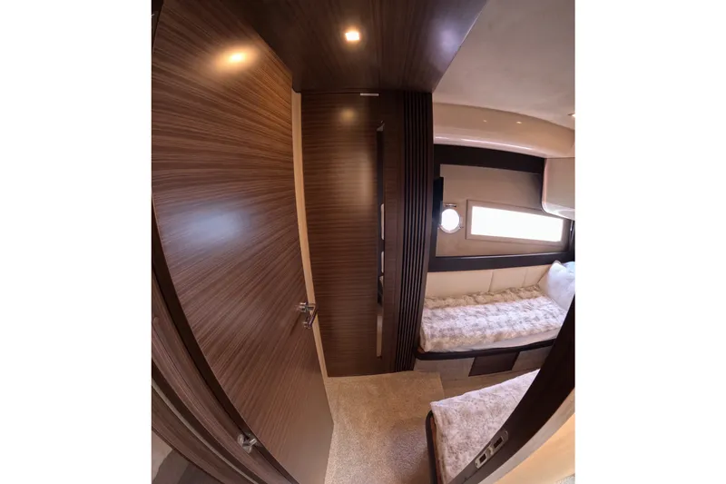 Slide: The Image of Interior of 2016 Azimut 55S yacht with cozy twin beds and wooden finishes. - 102
