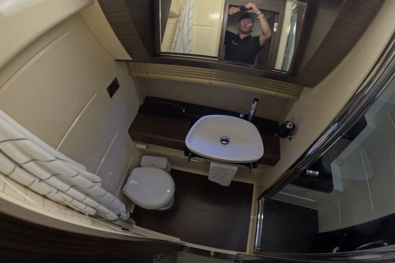 Slide: The Image of Bathroom interior of 2016 Azimut 55S yacht with modern sink and toilet. - 98