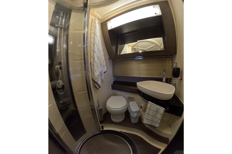 Slide: The Image of Luxurious bathroom in 2016 Azimut 55S yacht with modern fixtures and elegant design. - 113