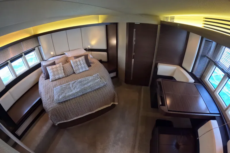Slide: The Image of Luxurious bedroom interior of 2016 Azimut 55S yacht with elegant furnishings and ample natural light. - 78