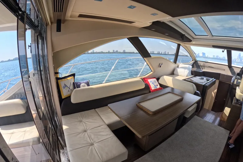 Slide: The Image of Luxurious interior of a 2016 Azimut 55S yacht with scenic ocean views. - 51