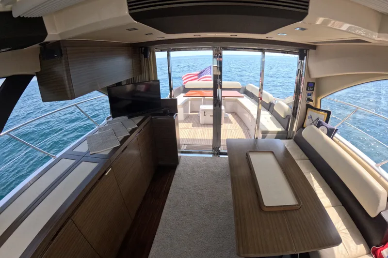 Slide: The Image of Interior of 2016 Azimut 55S yacht with elegant seating and ocean view. - 55