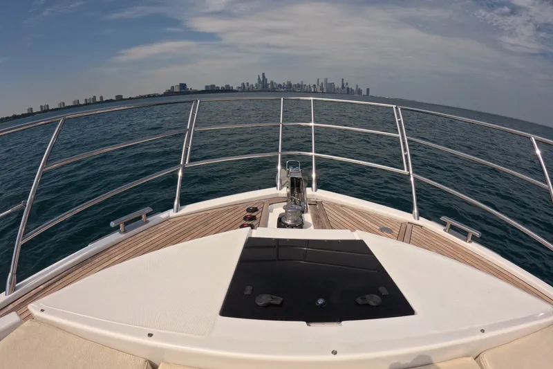 Slide: The Image of Bow view from 2016 Azimut 55S yacht, city skyline in the distance. - 25