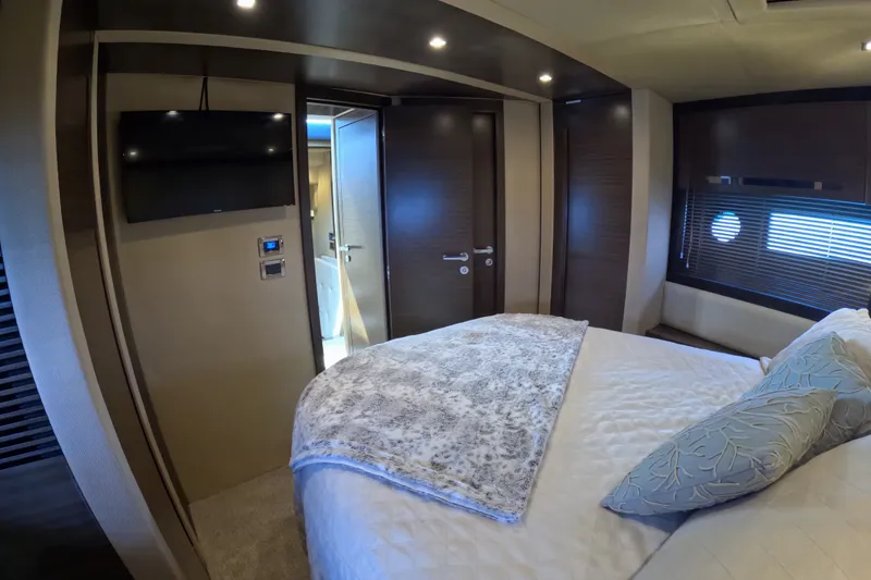 Slide: The Image of Luxurious bedroom interior of 2016 Azimut 55S yacht with modern decor and amenities. - 126