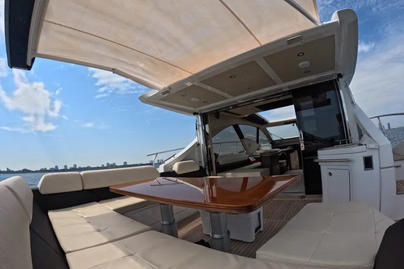 Slide: The Image of Luxurious 2016 Azimut 55S yacht with spacious outdoor seating and elegant interior. - 30