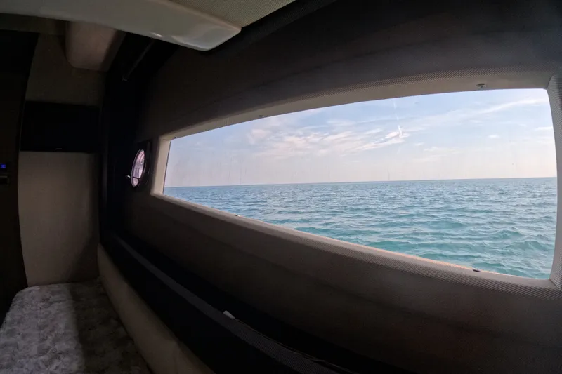 Slide: The Image of View of the ocean through Azimut 55S yacht window, 2016 model. - 109