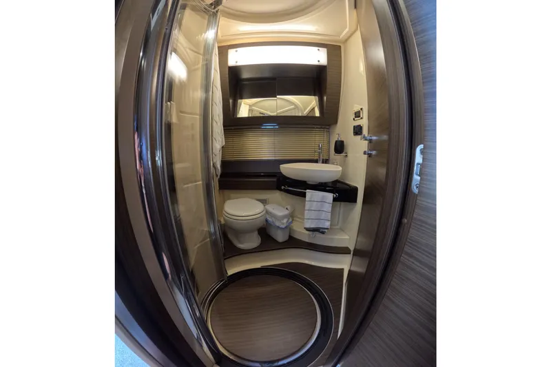 Slide: The Image of Luxurious bathroom in 2016 Azimut 55S yacht with modern fixtures and elegant design. - 116