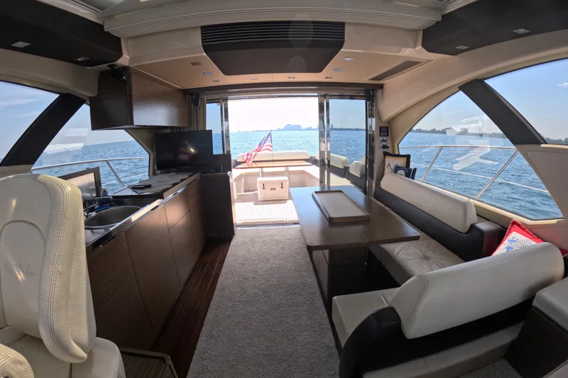Slide: The Image of Luxurious interior of 2016 Azimut 55S yacht with ocean view and elegant furnishings. - 68