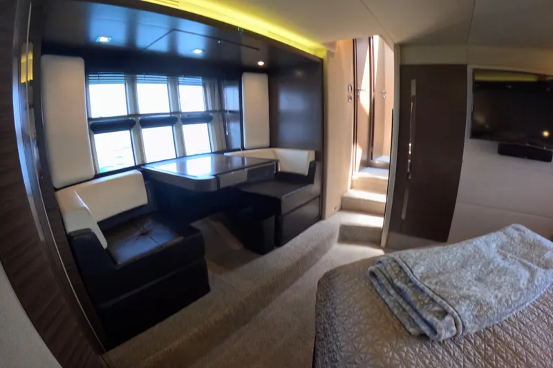 Slide: The Image of Luxurious interior of a 2016 Azimut 55S yacht with elegant seating and modern decor. - 87