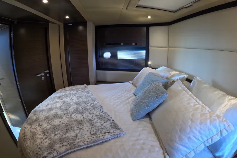 Slide: The Image of Luxurious bedroom interior of 2016 Azimut 55S yacht with elegant bedding and modern design. - 127