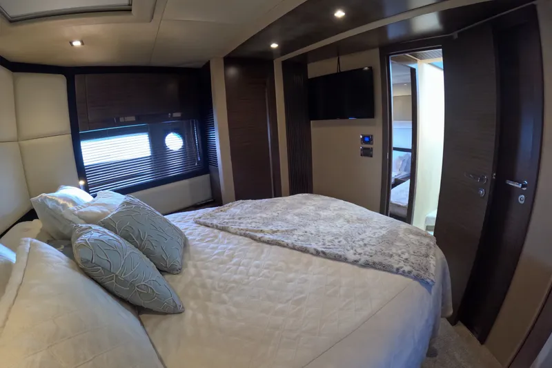 Slide: The Image of Luxurious bedroom interior of 2016 Azimut 55S yacht with elegant bedding and modern decor. - 122