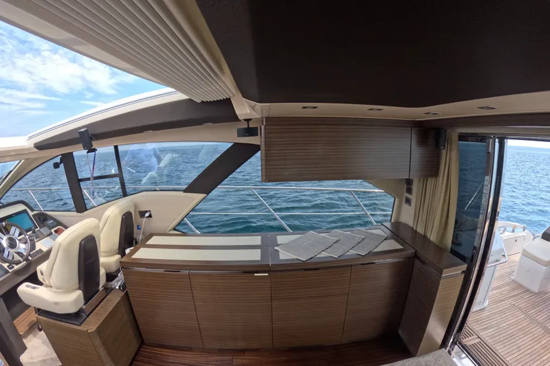 Slide: The Image of Luxurious interior of a 2016 Azimut 55S yacht with ocean view. - 44