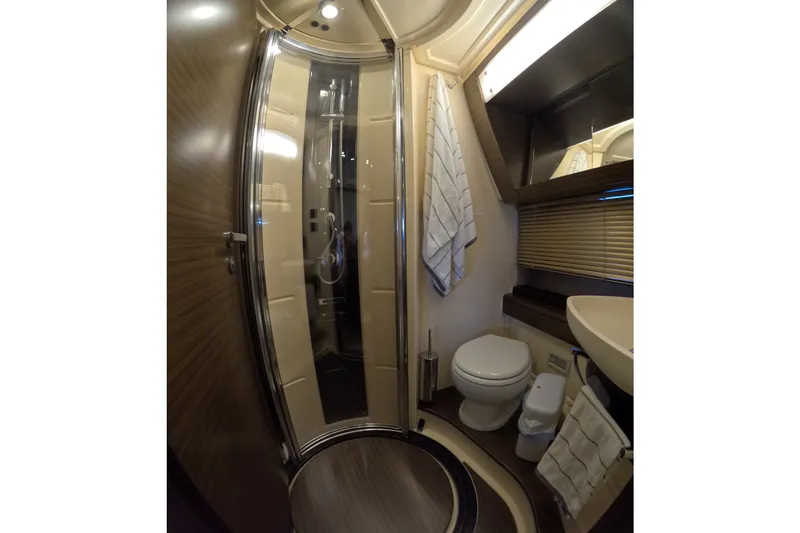 Slide: The Image of Luxurious bathroom in 2016 Azimut 55S yacht with modern shower and fixtures. - 114