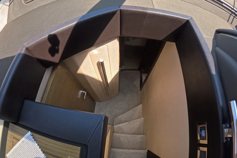Slide: The Image of Interior stairs of 2016 Azimut 55S yacht, featuring modern design and luxurious materials. - 74