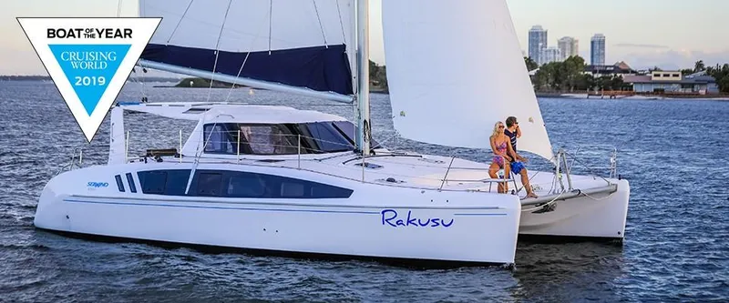 Slide: The Image of 2024 Seawind 1260 Owners Version catamaran sailing on water, awarded Boat of the Year 2019. - 4