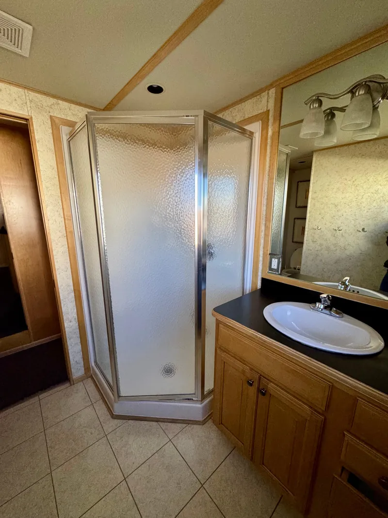 Slide: The Image of Bathroom in 2006 Sumerset Seas The Day Trip 4 with shower and vanity. - 21