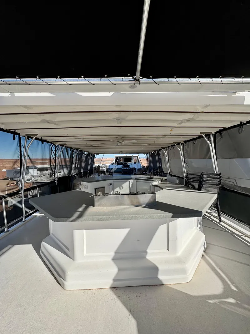 Slide: The Image of 2006 Sumerset Seas The Day Trip 4 yacht deck with shaded seating area. - 34