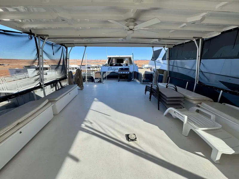 Slide: The Image of Spacious deck of 2006 Sumerset Seas The Day Trip 4 houseboat with seating and grill. - 36