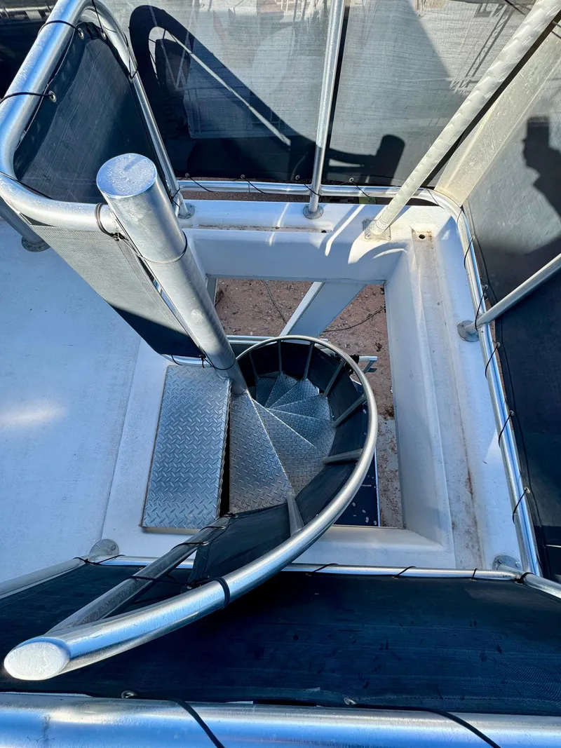 Slide: The Image of Spiral staircase on 2006 Sumerset Seas The Day Trip 4 houseboat. - 37