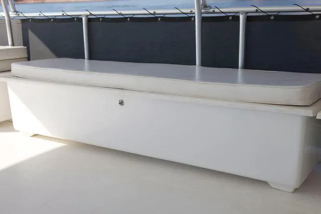 Slide: The Image of White bench seat on 2006 Sumerset Seas The Day Trip 4 boat deck. - 5